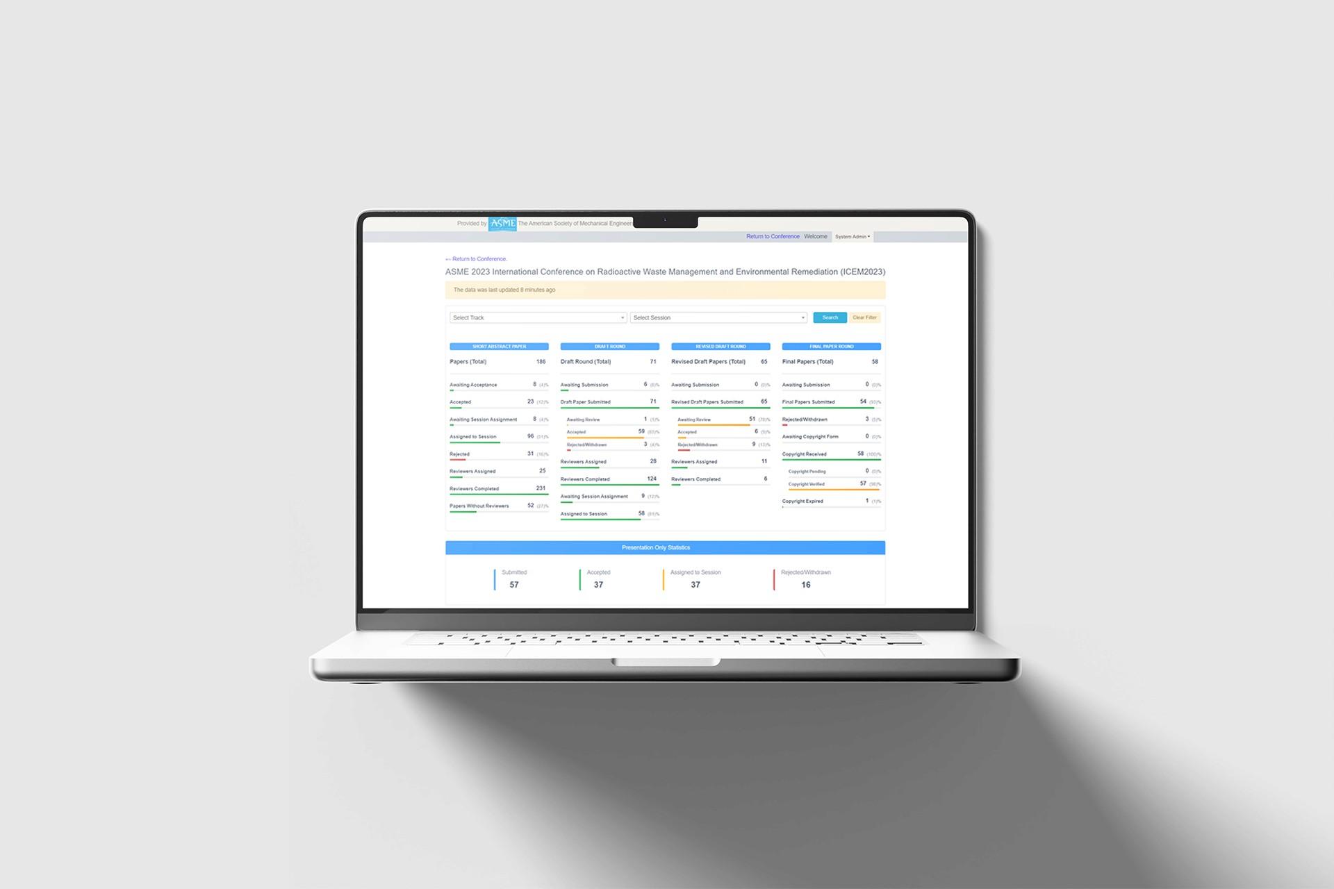 ASME patent submission management system on a laptop.